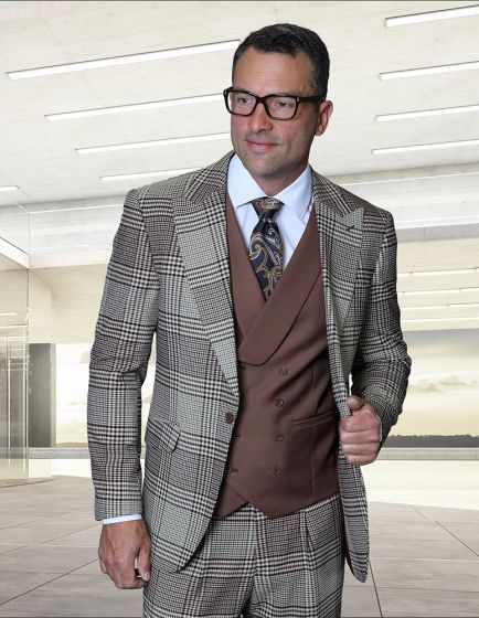 Statement men's 3-piece plaid suit features a modern fit with a structured shape, showcasing a light brown and dark brown checkered pattern. The suit is crafted from 100% wool and includes a double-breasted vest in a solid brown color, complete with a white dress shirt and patterned tie.