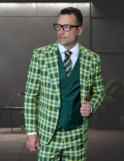 The Statement men's 3-piece plaid suit features a bold pattern in green and yellow, constructed from 100% wool. The modern fit includes a jacket with a notched lapel, a matching plaid vest, and tailored trousers. The components are coordinated in color and design.