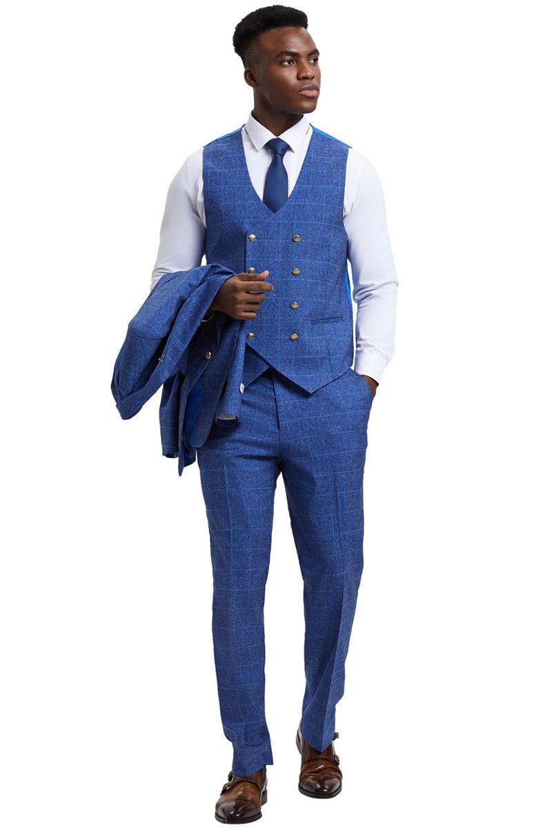 Men's Stacy Adams suit: Blue windowpane plaid double-breasted vest, peak lapel jacket & trousers. Textured fabric, subtle checkered pattern. Includes white shirt, blue tie, brown shoes.
