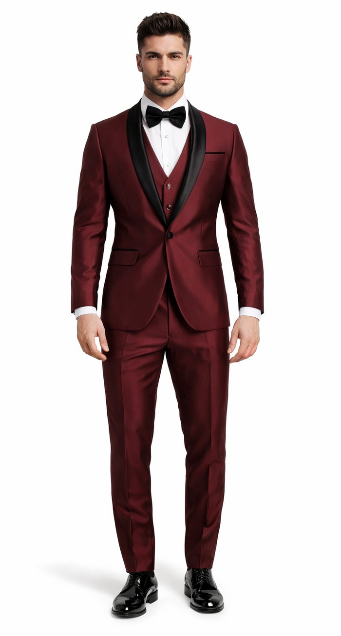 Burgundy 3-piece tuxedo with shawl lapel and tailored fit. Features a glossy finish, black satin lapel accents, jacket, vest, and matching trousers. Elegant and refined.
