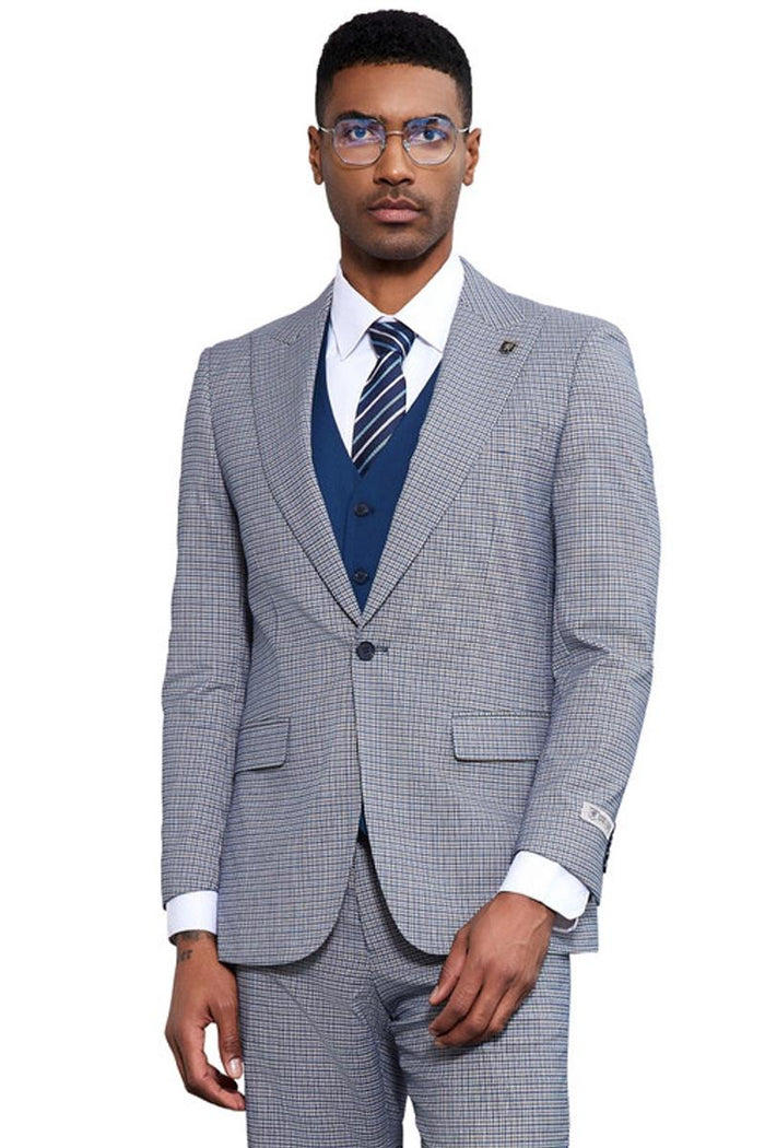 Men's light blue Stacy Adams vested suit with a micro check pattern. Features a fitted shape, peak lapels, and a structured, textured fabric. Includes matching vest. Formal yet visually interesting.
