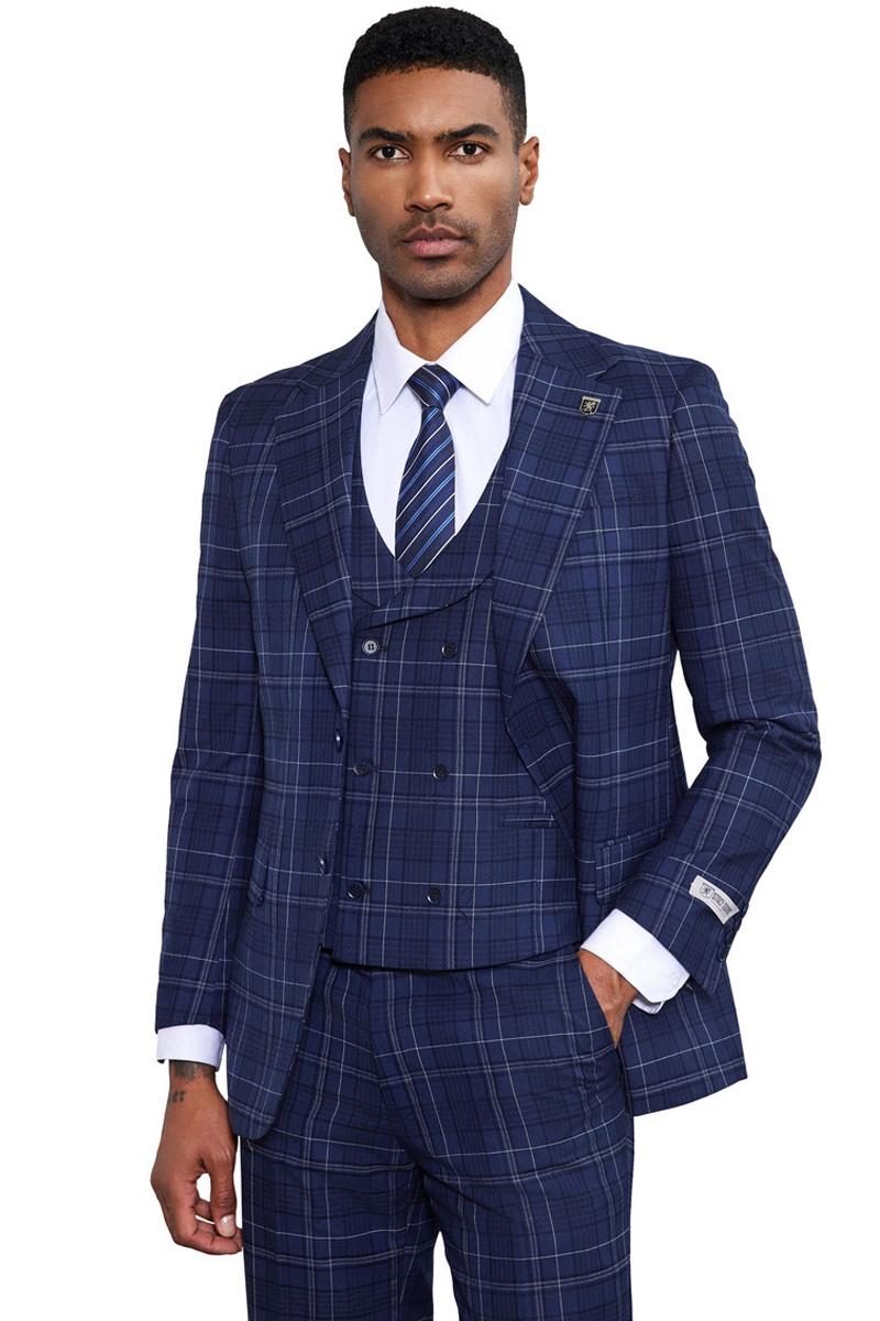 Navy Stacy Adams suit with double windowpane plaid. Includes a double-breasted vest. Structured, formal design with classic lapels and cuff detailing.
