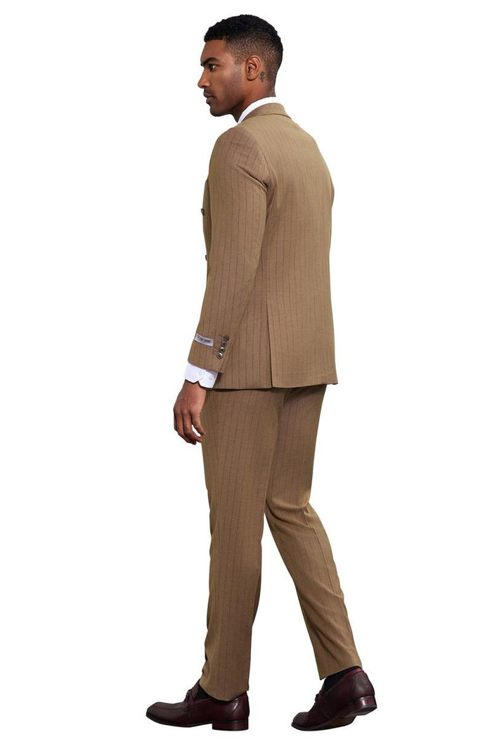 Stacy Adams men's camel double-breasted pinstripe suit. Tailored silhouette, fitted blazer, straight-cut trousers. Subtle pinstripes, white cuffs. Double-row buttons on blazer, single back vent. Matching trousers.
