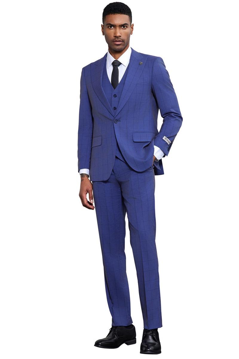 French blue Stacy Adams suit. Modern fit, tonal windowpane plaid. Two-button closure, notch lapels, side pockets. Matching vest. Straight-cut trousers. Textured, tailored look.
